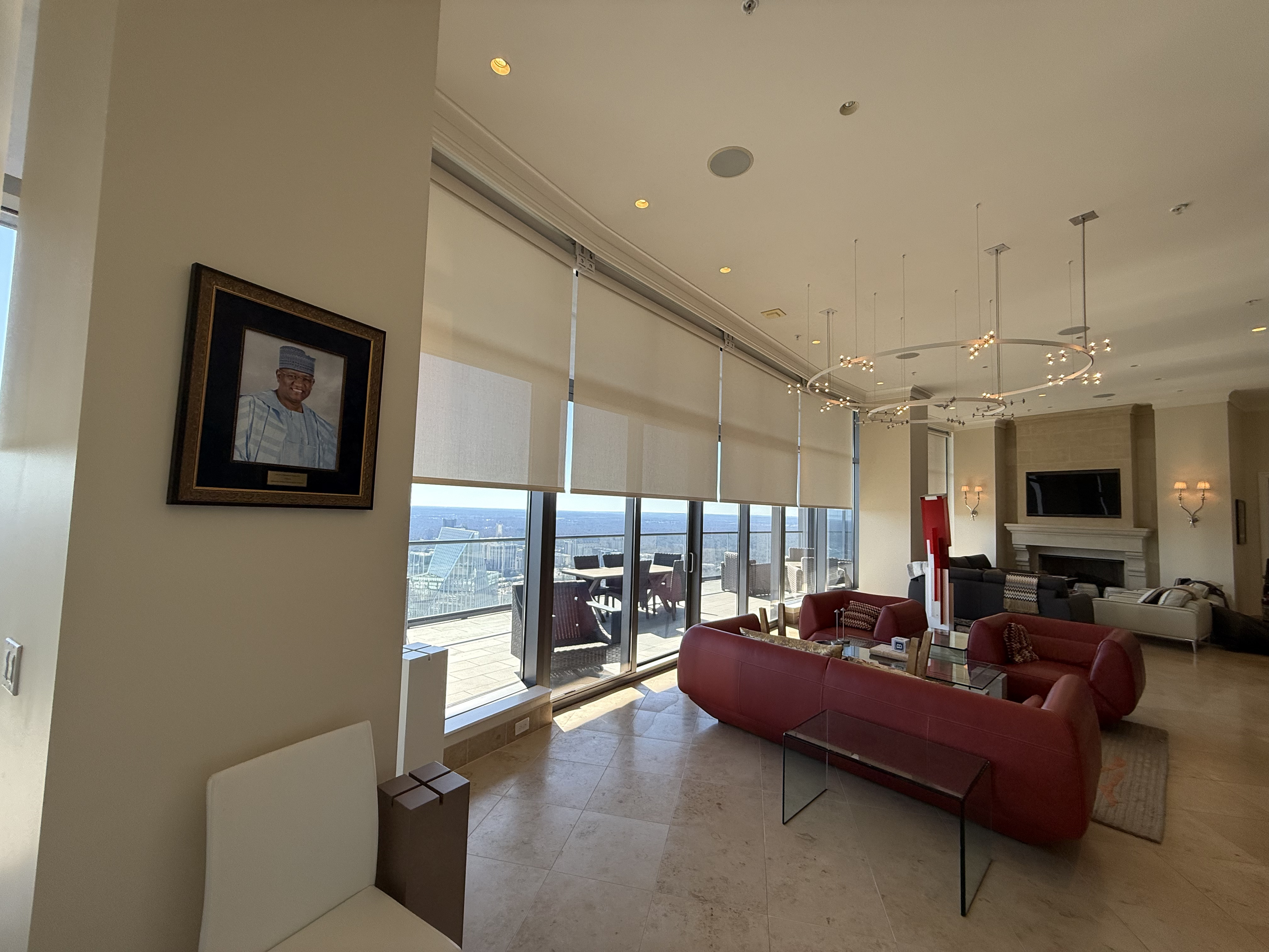 Dual roller shades in a primary bedroom