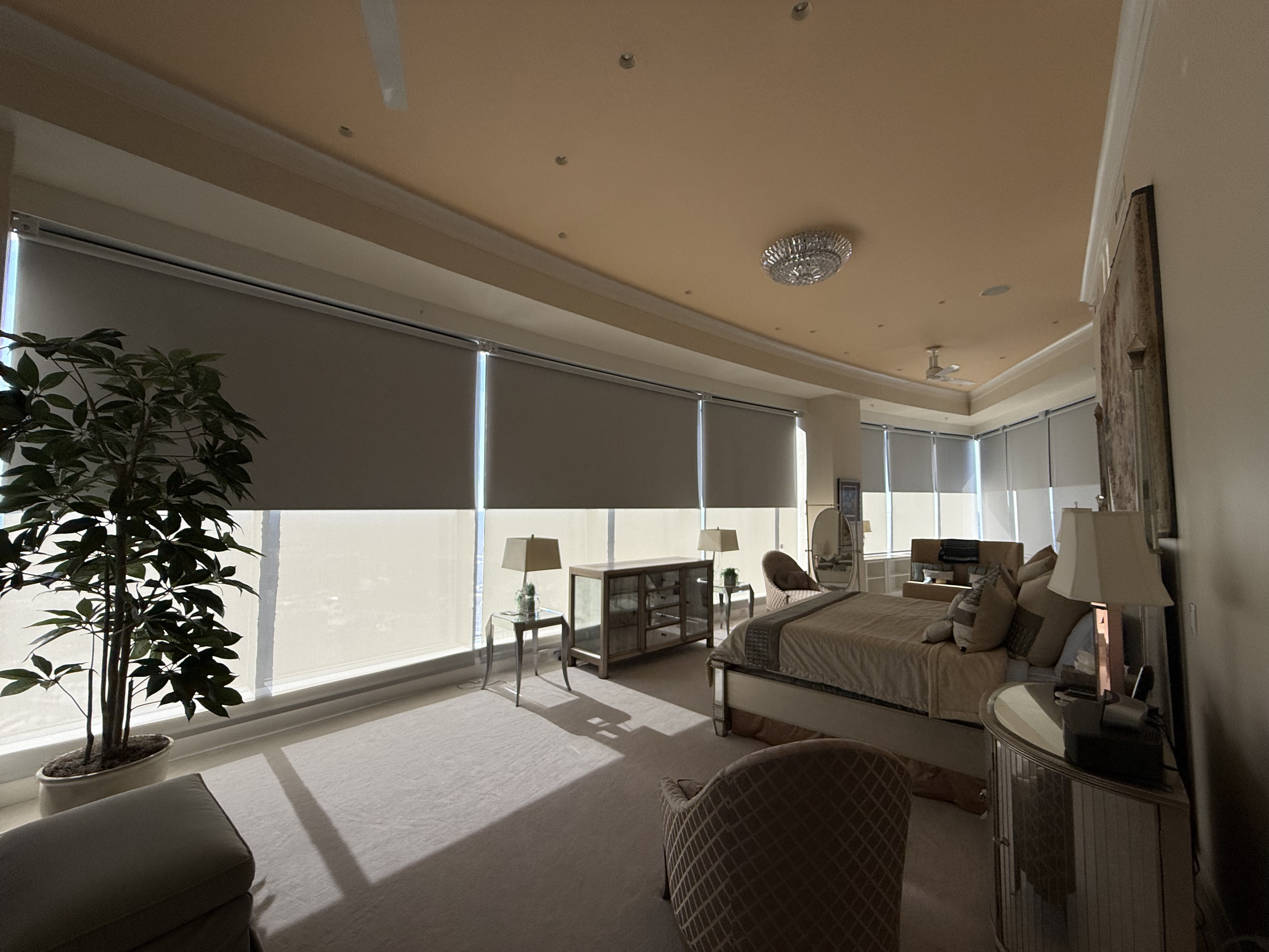 Dual roller shades in a penthouse living room