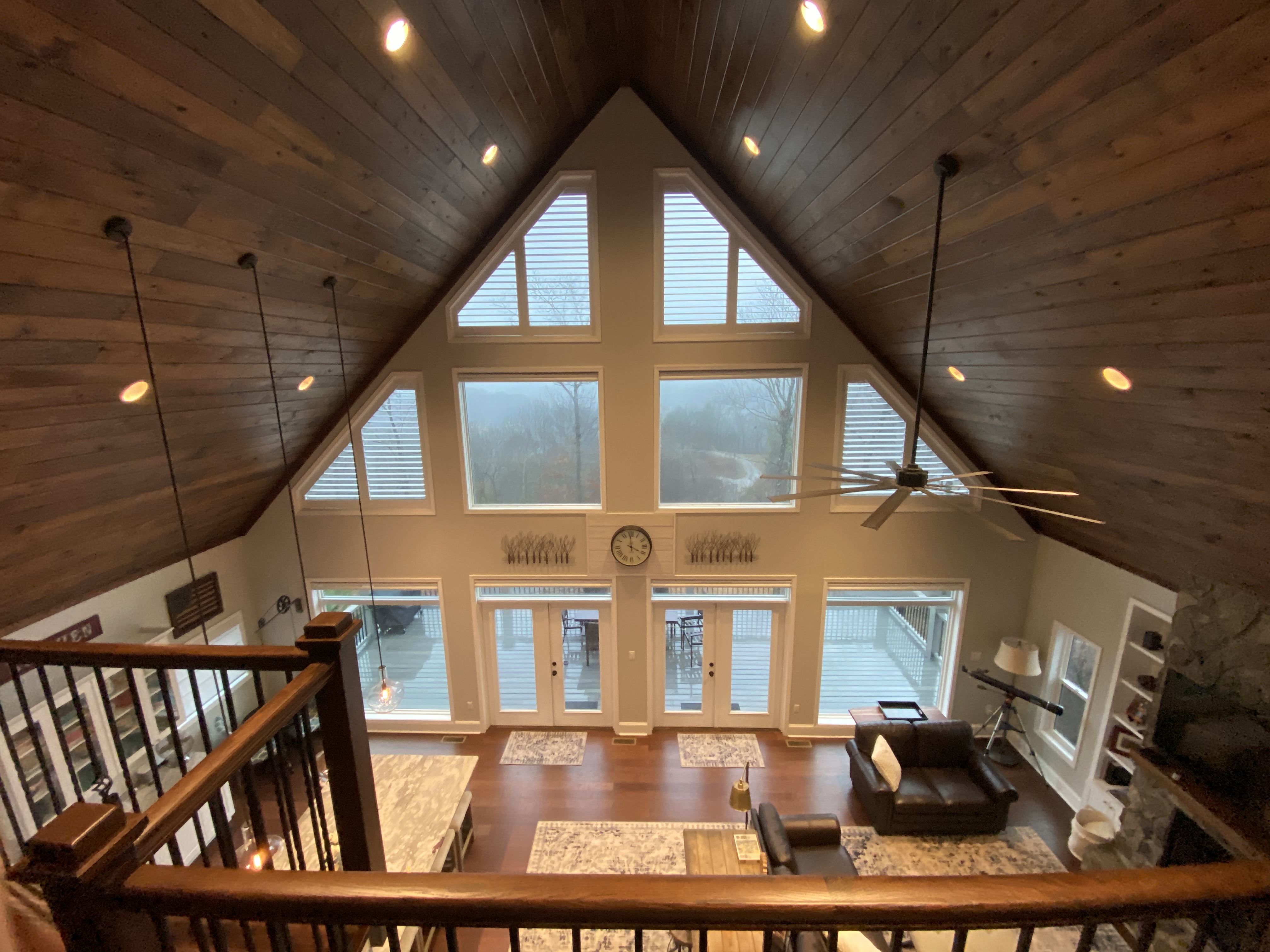 Specialty shutters on gable glazing
