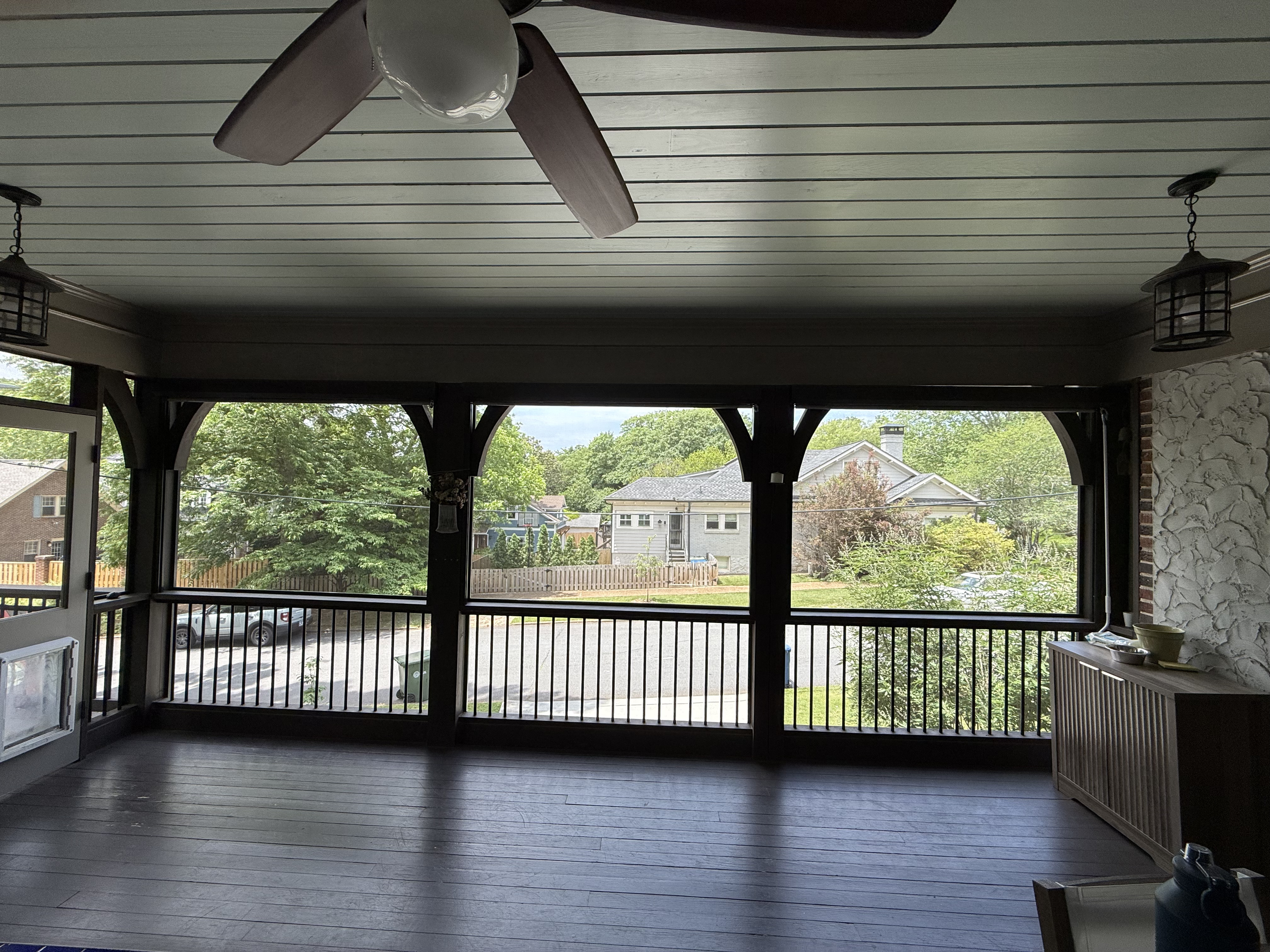 Motorized exterior porch screens retracted