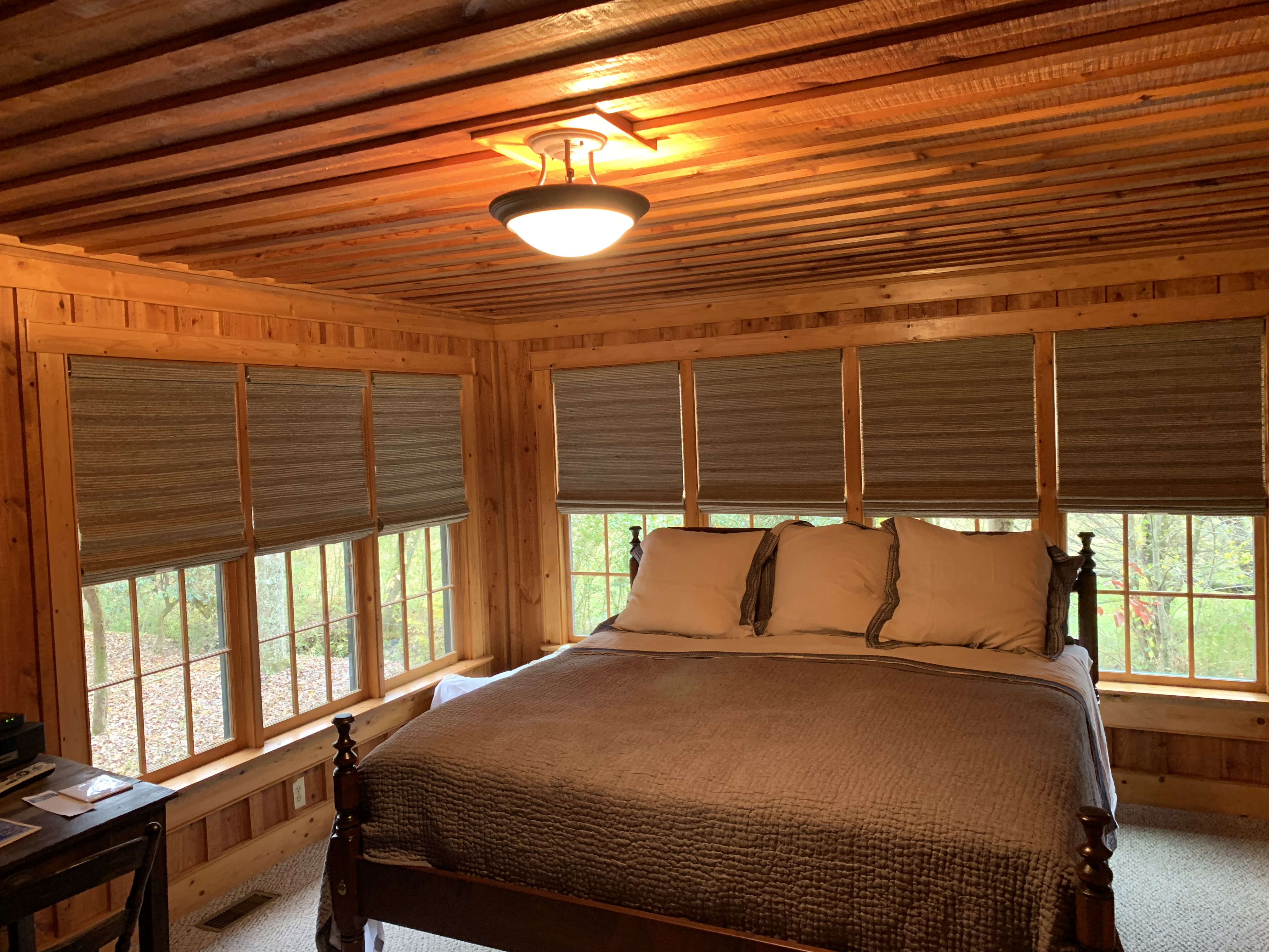 Woven wood shades in a timber cabin